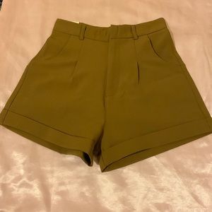 Berrita brown shorts in size small.